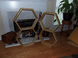 honeycomb shelves on fireplace