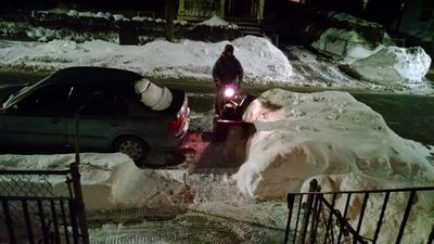 Driveway somewhere under this block of snow/ice